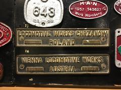 Metal locomotive number plates of various train manufacturers