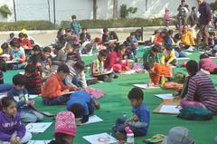 Children participating in a drawing and painting competition at the National Rail Museum of Indian Railways on Children's Day 2013