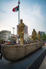 Statue of men in a boat at Palacio de Bellas Artes