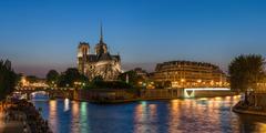 Panoramic view of Notre-Dame de Paris and Île de la Cité at dusk