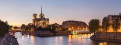 Notre-Dame cathedral at dusk viewed from Tournelle bridge