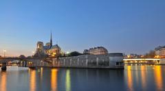 Notre Dame Cathedral at blue hour from Seine River banks, Paris