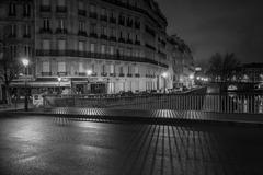 Paris cityscape at night with illuminated Eiffel Tower and skyline