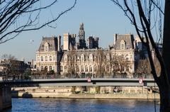 Hôtel de Ville de Paris behind Pont Saint-Louis viewed from Quai de la Tournelle