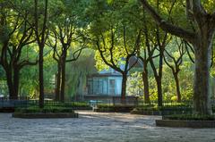 Luxun Park in Shanghai, China featuring lush greenery, people walking, and a serene lake