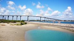 Brazilian bridge over water with surrounding greenery