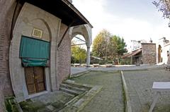 Exterior of Little Hagia Sophia Mosque with cemetery and mausoleum in Istanbul