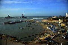 beautiful sea coast of Kanyakumari with mountains and coconut trees