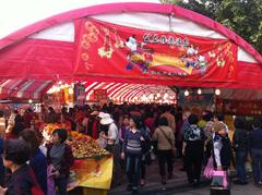 fair at Daan Park in Taipei with colorful stalls and people