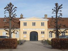 Entrance to Frilandsmuseet taken symmetrically from the front