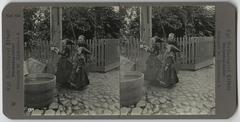 Amager girls in national costumes fetching water in 1904