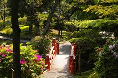 Kyu Yasuda Garden in Tokyo featuring a serene pond and traditional Japanese landscaping