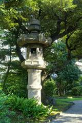 traditional Japanese stone lantern in Old Yasuda Garden, Tokyo