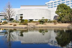 Traditional Japanese garden with pond and stepping stones