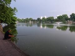 Angler at Hoan Kiem Lake in Hanoi