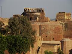 ruins of a centuries-old fort in India under a clear blue sky