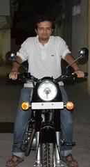 Personal portrait on a Royal Enfield Classic 350 motorcycle