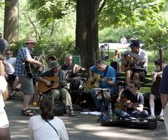 musicians playing Beatles medley at Strawberry Fields in Central Park