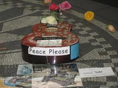 guitar placed on mosaic in Strawberry Fields, NYC