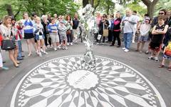 Strawberry Fields in Central Park, New York with an engraving