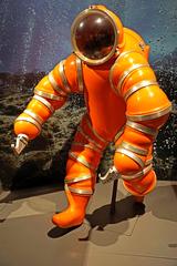 Newtsuit rigid-body diving suit on display in a museum