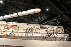 bicycles parked inside a train station