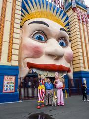 Assistance dog with clowns at Luna Park, Milsons Point, Sydney