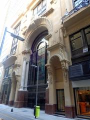 Galería Güemes interior view with ornate iron railings and glass dome