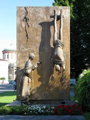 Monument in a public park with clear blue sky