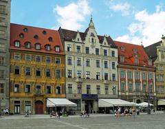 Kurfürstenseite des Breslauer Rings in Wrocław featuring Bürgerhaus buildings at Rynek 6, 7, and 8 with Passage Zur blauen Sonne