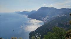 Sentiero degli Dei trail overlooking the Amalfi Coast with Positano and Capri in the background