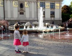 Little girls in Plac Szczepański, Krakow, Poland