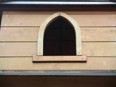 Detail of gothic arch on wooden building playground