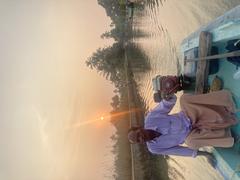 Backwaters of Alleppey with boatman in Kerala, India