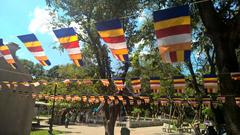 Buddhist flags at the One Pillar Pagoda