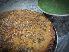 Gujarati Handava served with green chutney