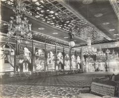 Interior view of a richly furnished pavilion for Prince Sher Zamakhanji's marriage at Junagadh, Gujarat, circa 1900