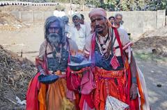 A group of men in India engaged in a baksheesh transaction