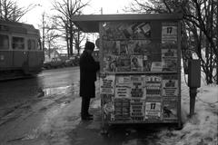 Man at newspaper stand in Katajanokka, Kanavakatu