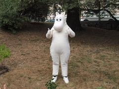 A person dressed as Moomintroll at Tove Jansson's Park, Katajanokka