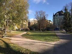 Tove Jansson park in Helsinki with view towards Hamngatan, featuring Aeolus building