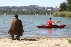 Pavel Cvrček sitting by Great Bolevec Lake in Pilsen