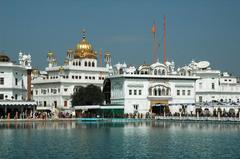 Akal Takht with holy flags and entry gate to the Harmandir Sahib