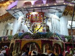 Akal Takht Sahib illuminated and decorated at night