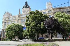 Nový zemský dům building in Brno covered with protective tarp over the coat of arms on the dome