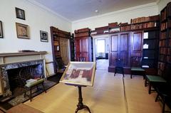 Bishop White's study room with desks, chairs, and bookshelves