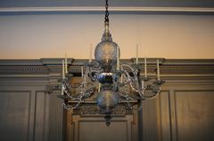 glass chandelier with 12 arms each holding a white candle in the Assembly Room of Independence Hall