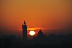 Silhouette of Luxmivilas Palace at sunrise