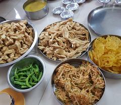 Gathiya, jalebi, chili, shredded carrots, and chutney from a street vendor in Vadodara