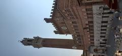 Palazzo Pubblico in Siena under a clear sky